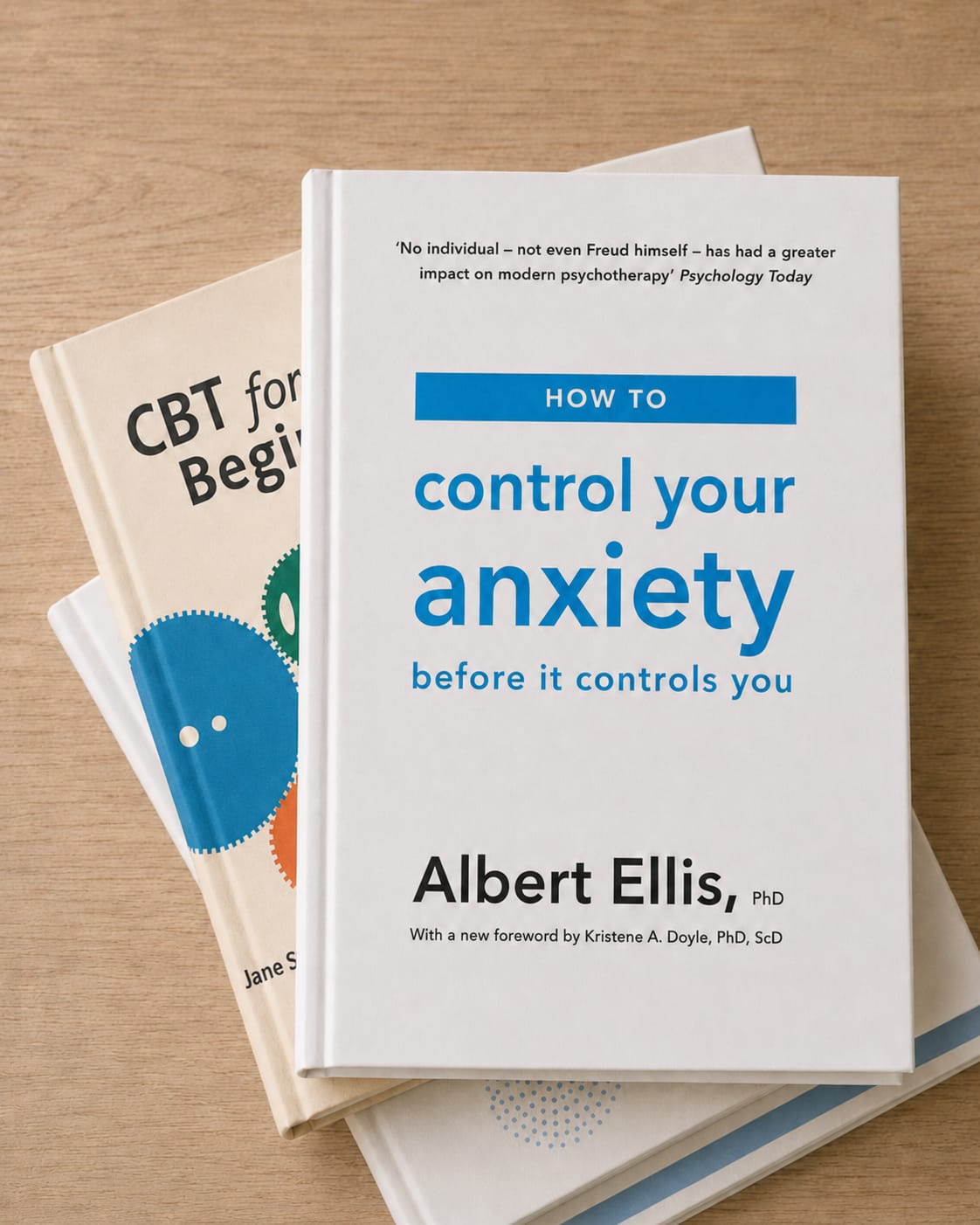 Το βιβλίο του Albert Ellis «How to Control Your Anxiety Before It Controls You» πάνω σε έναν οδηγό CBT
